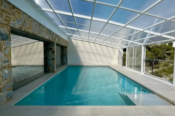 Abri piscine adossé